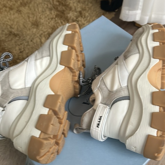 Prada sneakers It has a couple of little spots on it that’s cleanable. - Picture 8 of 12